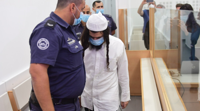 עמירם בן אוליאל במשפטו (צילום: אבשלום ששוני)