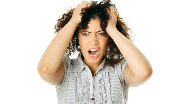 אישה עצבנית (צילום: אינג אימג')