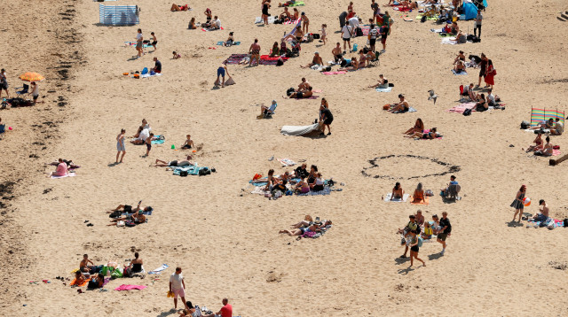 חוף ים בבריטניה - אילוסטרציה (צילום: REUTERS/Lee Smith)