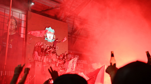 אוהדי ליברפול חוגגים אליפות קופ (צילום: PAUL ELLIS/AFP via Getty Images)