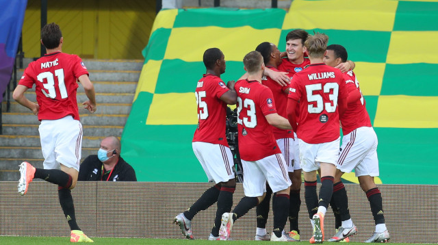 שחקני מנצ’סטר יונייטד חוגגים (צילום: Catherine Ivill/Getty Images)