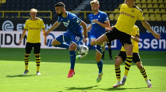 ארלינג הולאנד, מואנס דאבור (צילום: INA FASSBENDER/AFP via Getty Images)