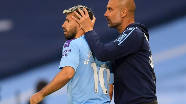 פפ גווארדיולה וסרחיו אגוארו. החלוץ ייעדר (צילום: LAURENCE GRIFFITHS/POOL/AFP via Getty Images)