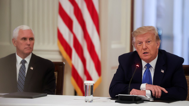 דונלד טראמפ ומייק פנס (צילום: רויטרס)