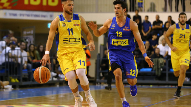 ג’ון דיברתולומאו, עמית עבו (צילום: לירון מולדובן)