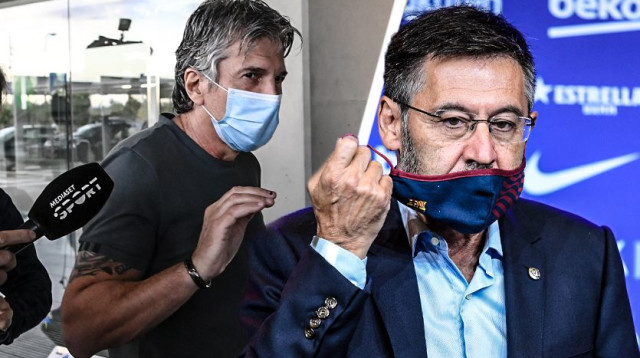 חורחה מסי , ג’וזף מריה ברתומאו (צילום: LLUIS GENE /  JOSEP LAGO / AFP VIA GETTY IMAGES)