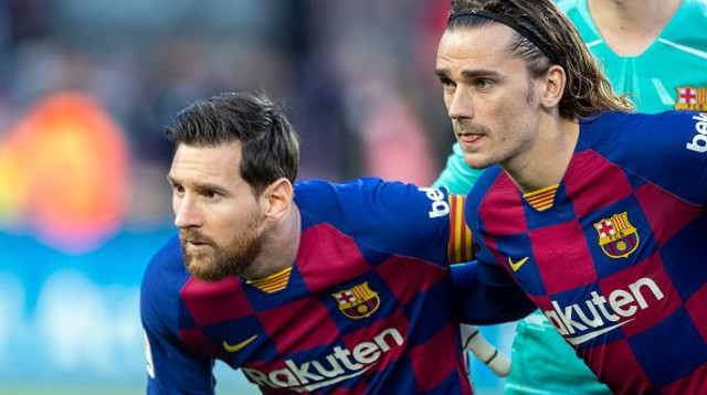 אנטואן גריזמן, ליאו מסי (צילום: Tim Clayton/Corbis via Getty Images)