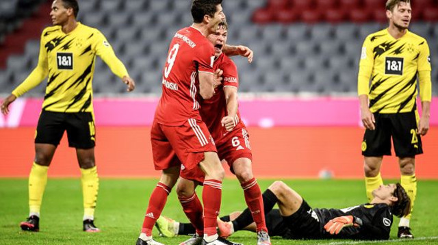 שחקני בורוסיה דורטמונד מאוכזבים על רקע החגיגות של באיירן מינכן (צילום: Matthias Hangst/Bundesliga/Bundesliga Collection v)