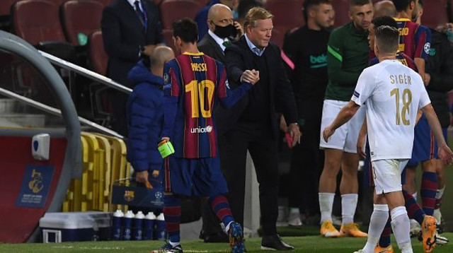 רונאלד קומאן וליאו מסי (צילום: Alex Caparros/Getty Images)