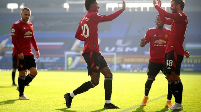 שחקני מנצ’סטר יונייטד חוגגים מהפך (צילום: Carl Recine - Pool/Getty Images)