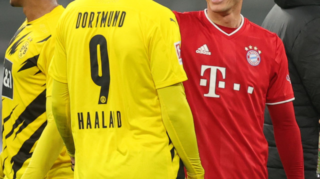 רוברט לבנדובסקי , ארלינג הולאנד (צילום: Friedemann Vogel - Pool/Getty Images)