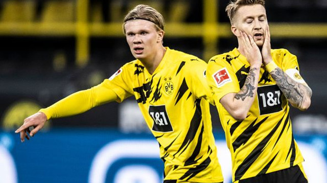 מרקו רויס, ארלינג הולאנד (צילום: Lars Baron/Bundesliga/Bundesliga Collection via Ge)