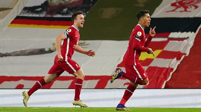 דיוגו ז’וטה חוגג עם רוברטו פירמינו (צילום: Jon Super - Pool/Getty Images)