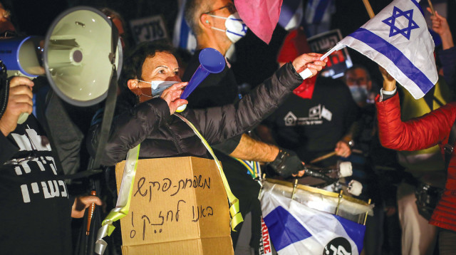 מפגינים בעד משפחת פרקש (צילום: חן ליאופולד, פלאש 90)