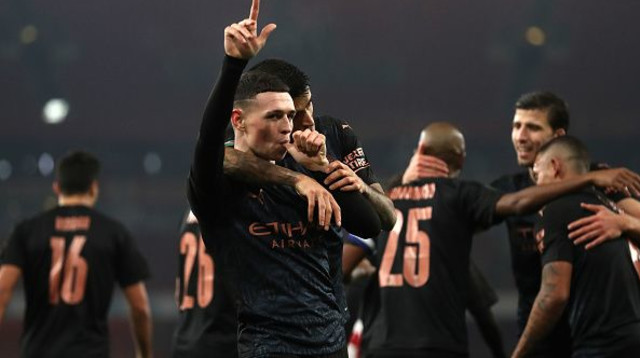 פיל פודן חוגג (צילום: Catherine Ivill/Getty Images)