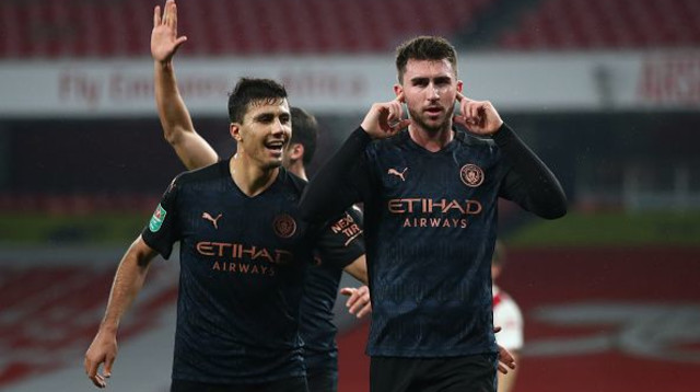 איימריק לאפורט ורודרי חוגגים (צילום: Manchester City FC/Manchester City FC via Getty Im)