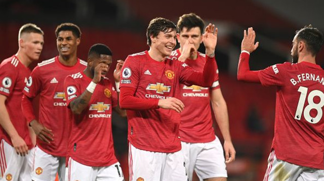 שחקני מנצ’סטר יונייטד חוגגים (צילום: Michael Regan/Getty Images)