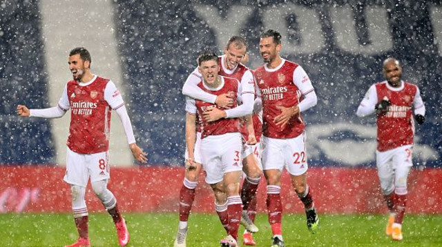 שחקני ארסנל חוגגים (צילום: Michael Regan/Getty Images)