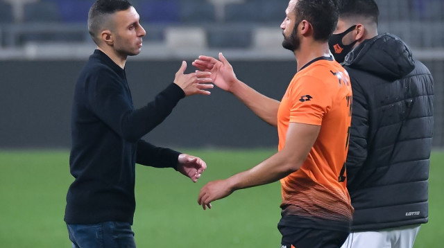 מוחמד גדיר, תמיר בן עמי (צילום: אריאל שלום)