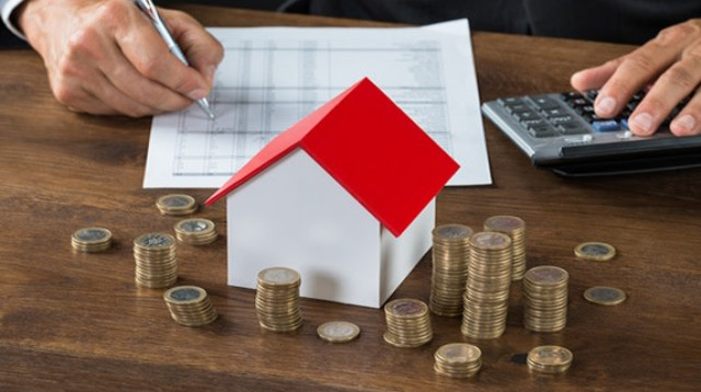 חישוב ארנונה (צילום: Shutterstock)