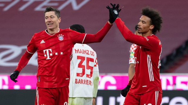 רוברט לבנדובסקי, לירוי סאנה (צילום: picture alliance / Contributor)