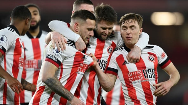 שחקני שפילד יונייטד חוגגים (צילום: STU FORSTER/POOL/AFP via Getty Images)