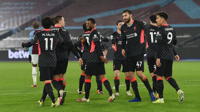 שחקני ליברפול חוגגים (צילום: John Powell/Liverpool FC via Getty Images)