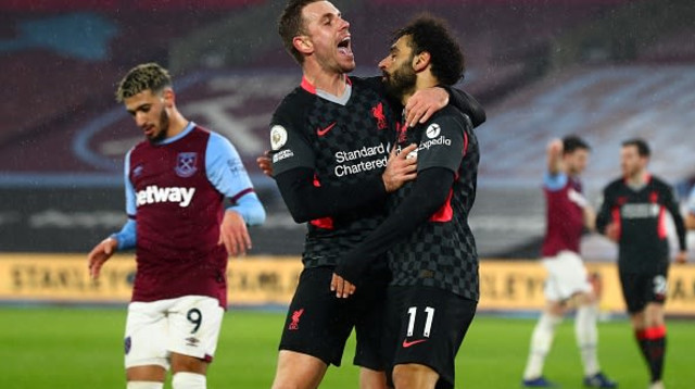 ג’ורדן הנדרסון, מוחמד סלאח (צילום: CLIVE ROSE/POOL/AFP via Getty Images)