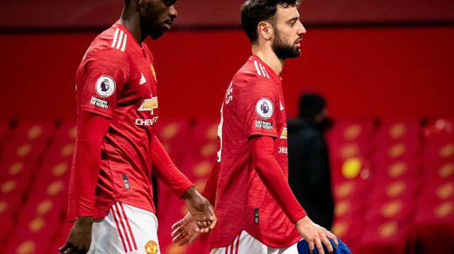 אקסל טואנזבה, ברונו פרננדס (צילום: Ash Donelon/Manchester United via Getty Images)