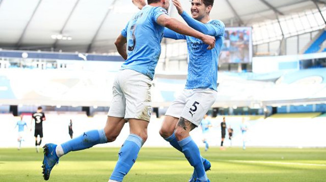 ג’ון סטונס , רובן דיאש (צילום: Matt McNulty/Manchester City FC via Getty Images)