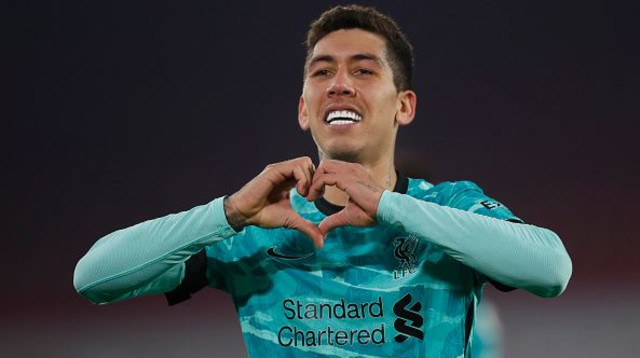 רוברטו פירמינו חוגג (צילום: Lee Smith - Pool/Getty Images)