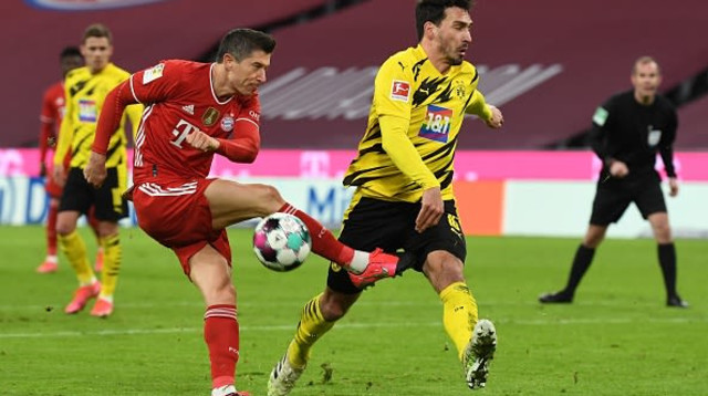 רוברט לבנדובסקי, מאטס הומלס (צילום: ANDREAS GEBERT/POOL/AFP via Getty Images)