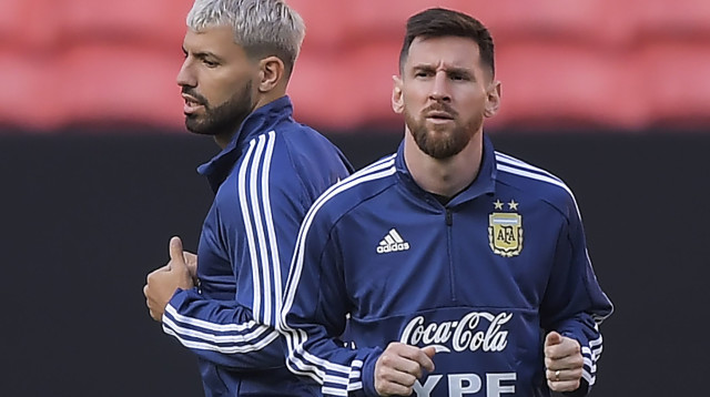 ליאו מסי, סרחיו אגוארו (צילום: CARL DE SOUZA/AFP/Getty Images)