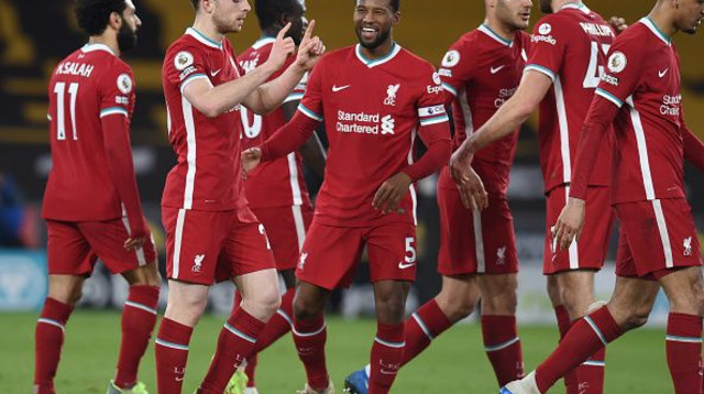 דיוגו ז’וטה ושחקני ליברפול חוגגים (צילום: John Powell/Liverpool FC via Getty Images)