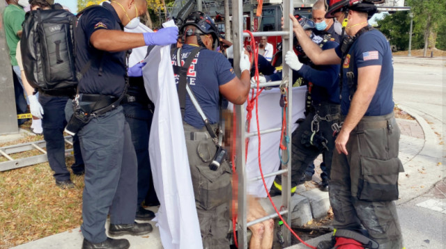 חילוץ הנעדרת הערומה מפתח הביוב (צילום: רשתות חברתיות)