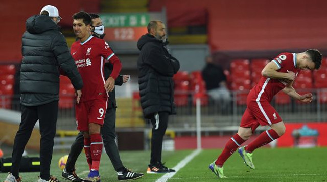 דיוגו ז'וטה, יורגן קלופ, רוברטו פירמינו (צילום: John Powell/Liverpool FC via Getty Images)