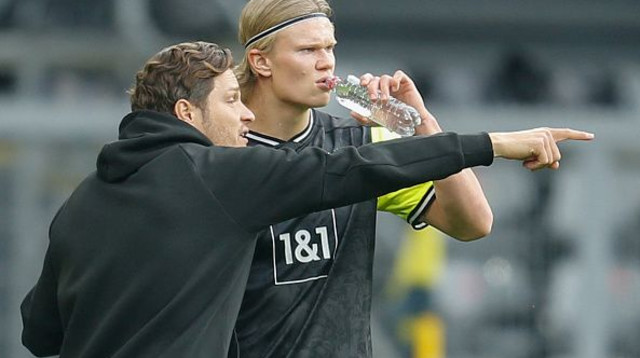 ארלינג הולאנד, אדין טרזיץ' (צילום: LEON KUEGELER/POOL/AFP via Getty Images)