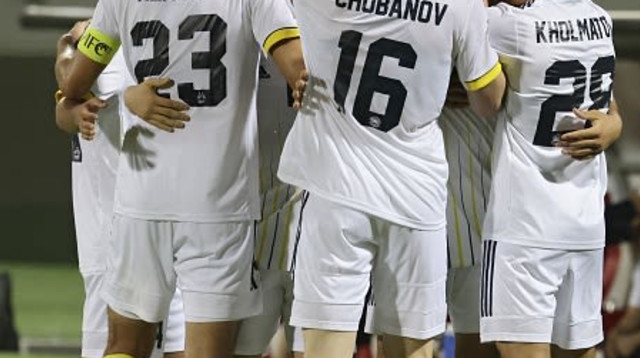 שחקני פחטקור חוגגים (צילום: KARIM SAHIB/AFP via Getty Images)