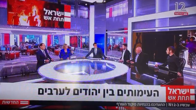 עימות באולפן חדשות 12 (צילום: צילום מסך חדשות 12)
