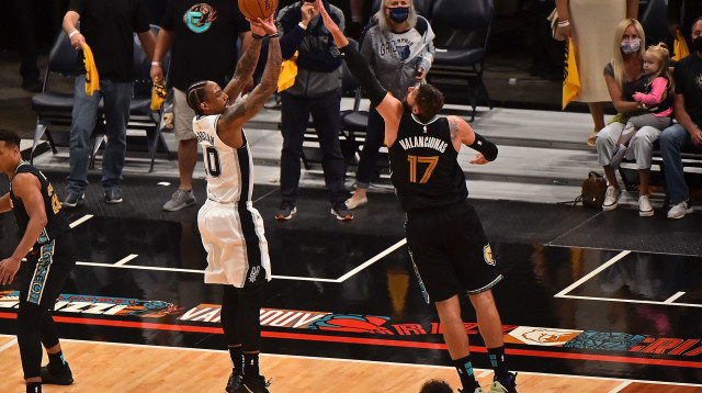 דמאר דרוזן, יונאס ולנצ'ונאס (צילום: Justin Ford/Getty Images)