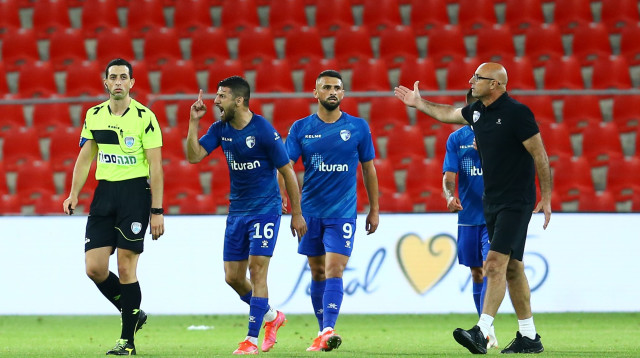 מוחמד שכר, אביעד שילוח (צילום: לירון מולדובן)