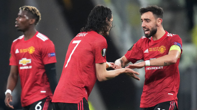 שחקני מנצ'סטר יונייטד חוגגים (צילום: MICHAEL SOHN/POOL/AFP via Getty Images)