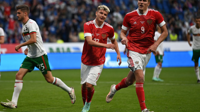 שחקני רוסיה חוגגים (צילום: KIRILL KUDRYAVTSEV/AFP via Getty Images)