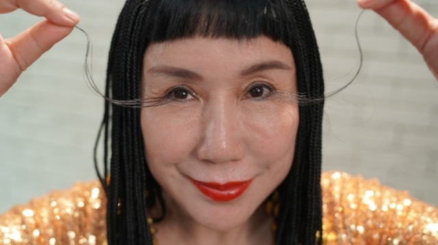 יו ג'יאנשיה, בעלת הריסים הארוכות בעולם (צילום: Guinness World Records)