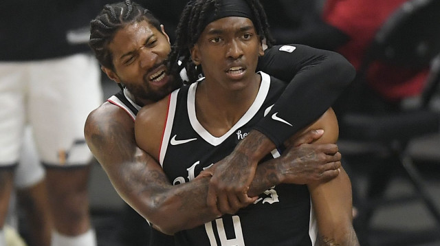 טרנס מאן ופול ג'ורג' (צילום: Kevork Djansezian/Getty Images)