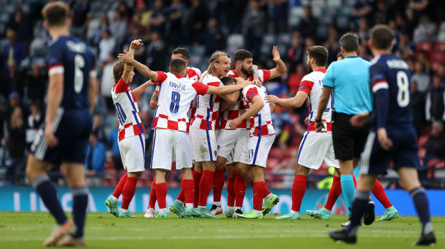שחקני קרואטיה חוגגים (צילום: Lee Smith - Pool/Getty Images)