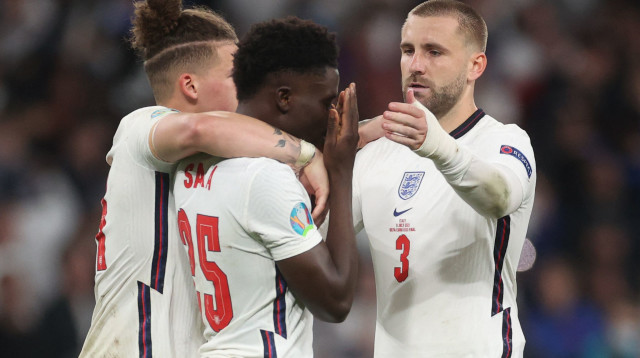 לוק שואו, בוקאיו סאקה, קלווין פיליפס (צילום: CARL RECINE/POOL/AFP via Getty Images)