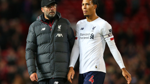 וירג'יל ואן דייק, יורגן קלופ (צילום: MIGUEL MEDINA/AFP via Getty Images)