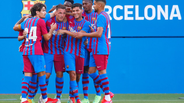 שחקני ברצלונה חוגגים (צילום: Eric Alonso/Getty Images)