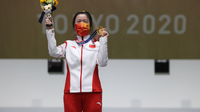 קיאן יאנג. זהב ראשון לסין (צילום: Kevin C. Cox/Getty Images)